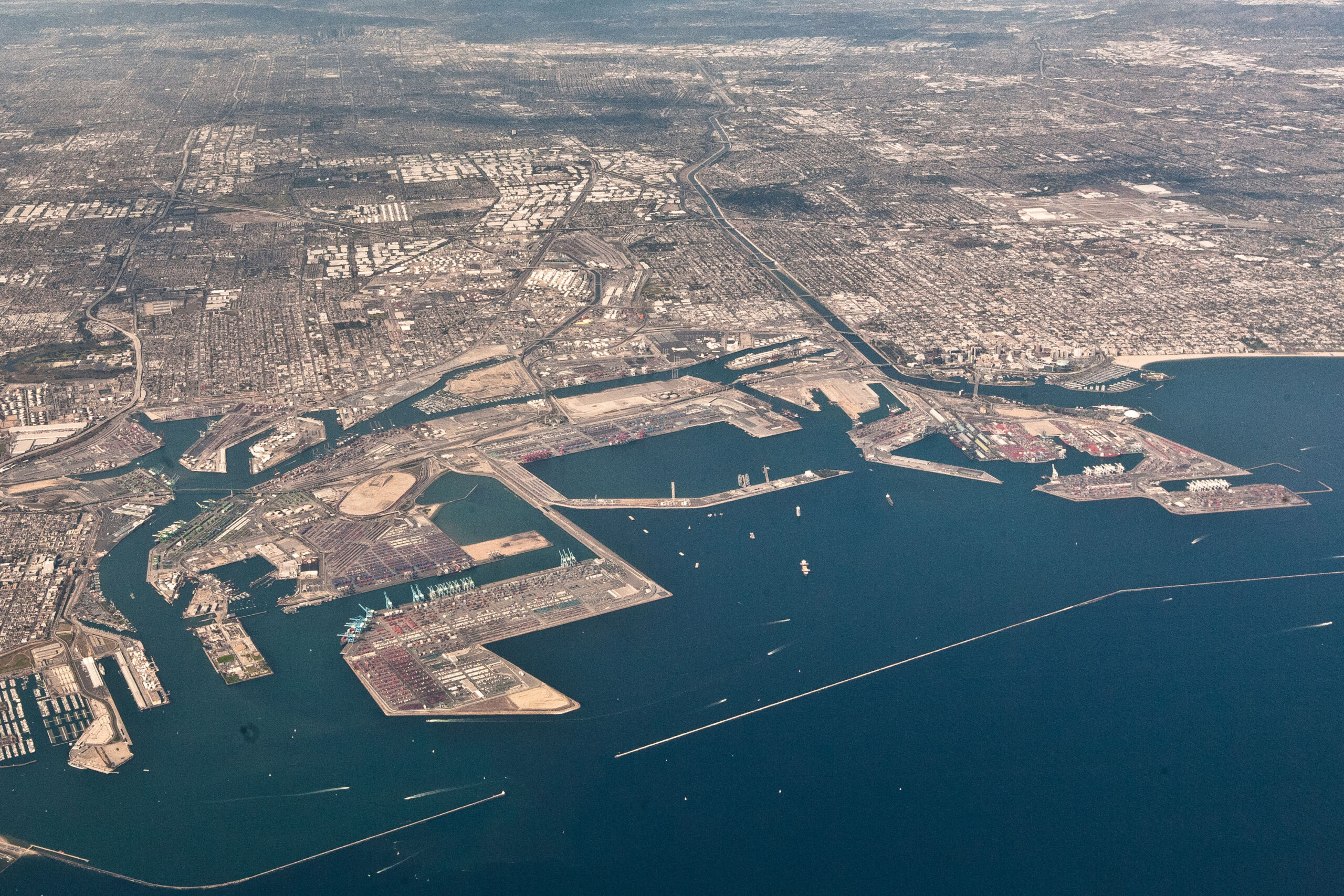 Aerial view of a major shipping port with container terminals
